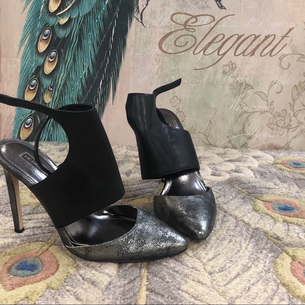 Silver and black heels